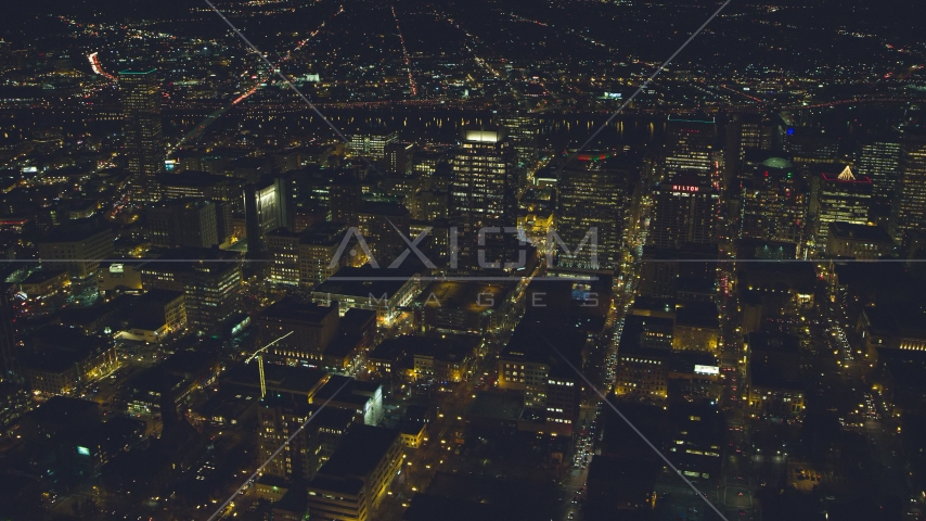 High-rises, skyscrapers, and busy streets at nighttime in Downtown Portland, Oregon Aerial Stock Photo AX155_401.0000260F | Axiom Images