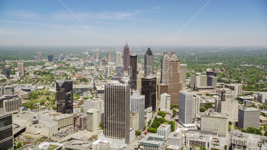 Downtown skyscrapers and Westin Peachtree Plaza Hotel, Atlanta, Georgia Aerial Stock Photo AX36_004.0000076F | Axiom Images