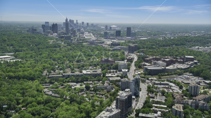 High above office buildings looking toward Midtown Atlanta skyline; Buckhead, Georgia Aerial Stock Photo AX36_082.0000067F | Axiom Images