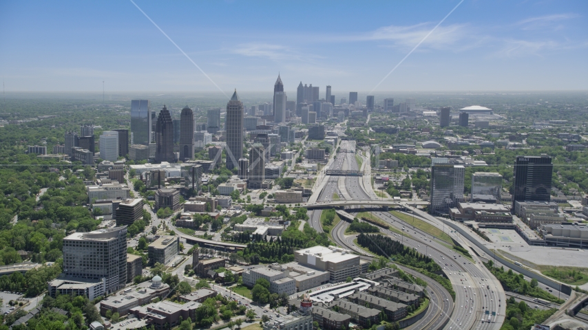 Downtown Connector near Midtown Atlanta skyscrapers, Georgia Aerial Stock Photo AX36_085.0000068F | Axiom Images