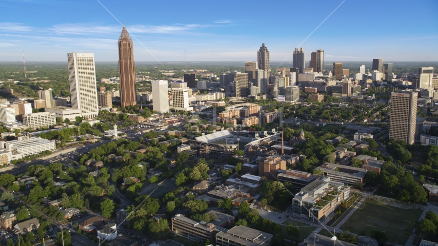 Midtown and Downtown Atlanta skyscrapers behind the Bobby Dodd Sports Stadium, Atlanta, Georgia Aerial Stock Photo AX39_028.0000127F | Axiom Images