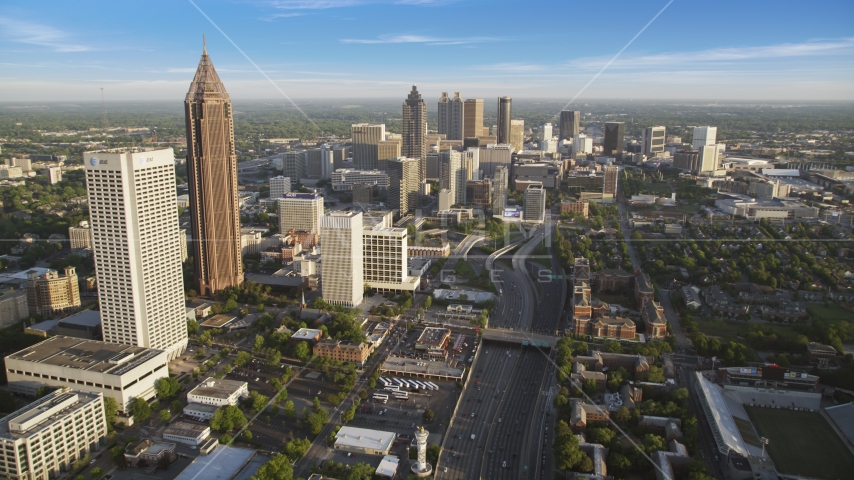 Downtown Connector and Downtown skyscrapers in the distance, Atlanta, Georgia Aerial Stock Photo AX39_063.0000068F | Axiom Images