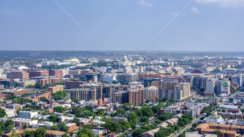 The United States Capitol seen from apartment complexes in Washington DC Aerial Stock Photo AXP075_000_0013F | Axiom Images