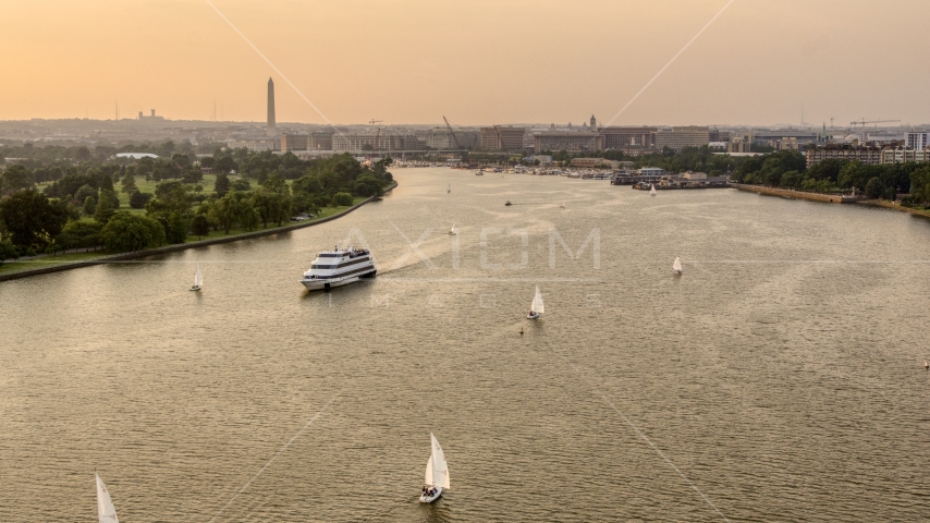 Sailboats and ferry on Washington Channel near Washington Monument, Washington D.C., sunset Aerial Stock Photo AXP076_000_0006F | Axiom Images