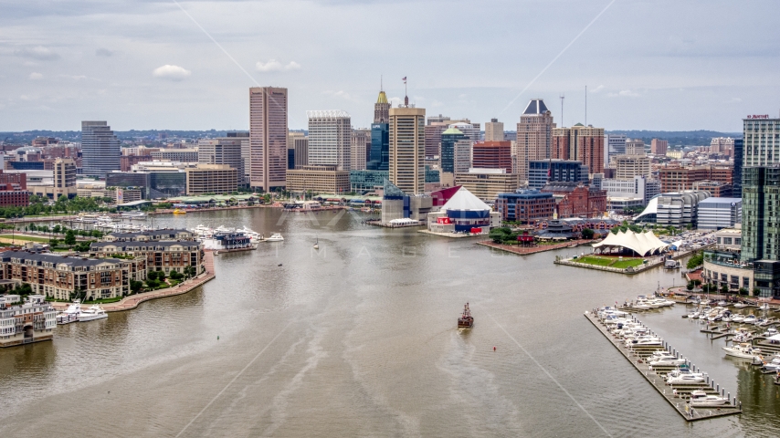 Downtown Baltimore skyscrapers, Inner Harbor piers, and the National Aquarium, Maryland Aerial Stock Photo AXP078_000_0010F | Axiom Images