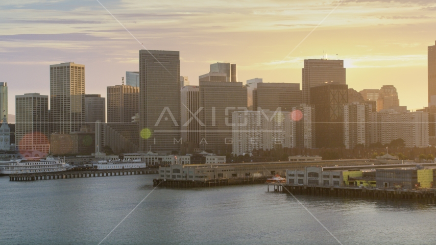 The downtown skyline, seen from piers on the bay, Downtown San Francisco, California, sunset Aerial Stock Photo DCSF07_015.0000091 | Axiom Images