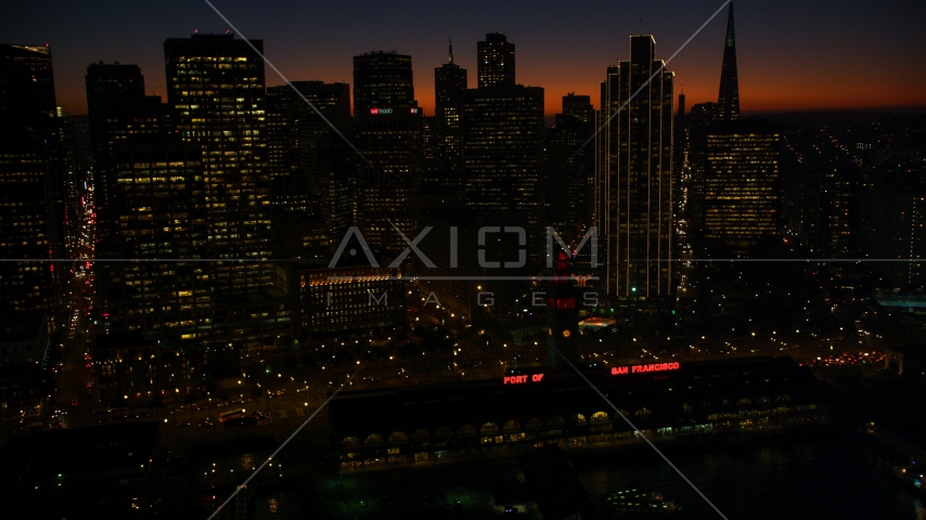 The downtown skyline and Ferry Building in Downtown San Francisco, California, twilight Aerial Stock Photo DCSF07_111.0000313 | Axiom Images