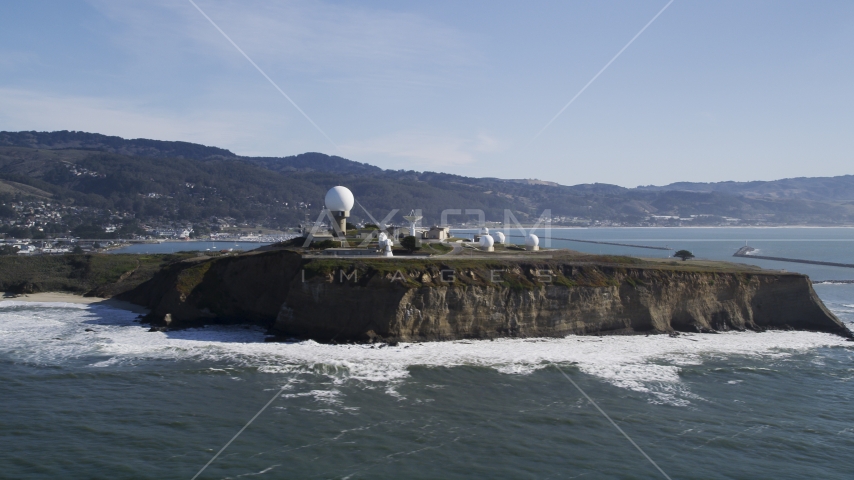 The Pillar Point Air Force Station near coastal hills in Half Moon Bay, California Aerial Stock Photo DFKSF15_068.0000333 | Axiom Images