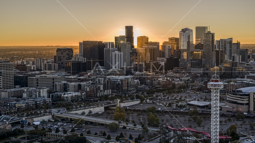 Sunrise behind the city's skyline in Downtown Denver, Colorado Aerial Stock Photo DXP001_000092 | Axiom Images