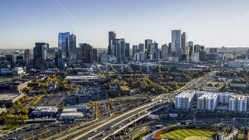 Tall skyscrapers of city skyline seen from Colfax Avenue, Downtown Denver, Colorado Aerial Stock Photo DXP001_000121 | Axiom Images