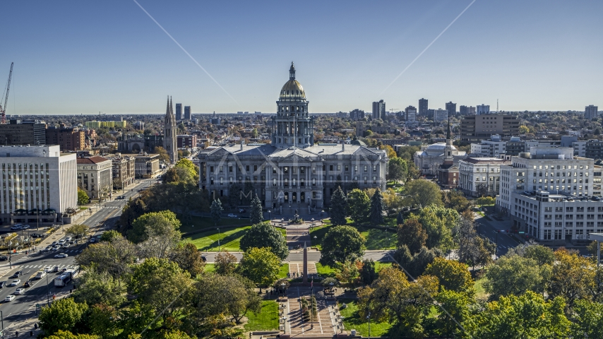 Colorado State Capitol building seen from the trees at Civic Center Park in Downtown Denver, Colorado Aerial Stock Photo DXP001_000140 | Axiom Images