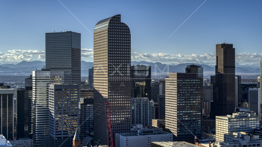 Wells Fargo Center skyscraper and nearby high-rises in Downtown Denver, Colorado Aerial Stock Photo DXP001_000173 | Axiom Images