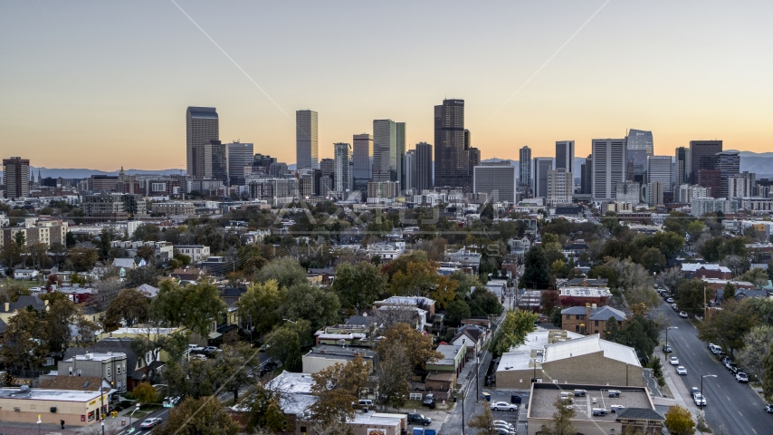 Skyscrapers in the city's downtown skyline at sunset, Downtown Denver, Colorado Aerial Stock Photo DXP001_000186 | Axiom Images