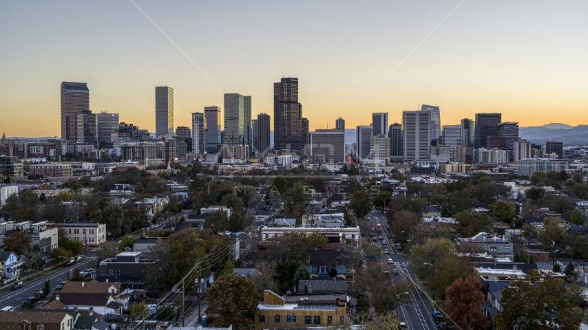 Skyscrapers in the city's skyline at sunset, Downtown Denver, Colorado Aerial Stock Photo DXP001_000187 | Axiom Images