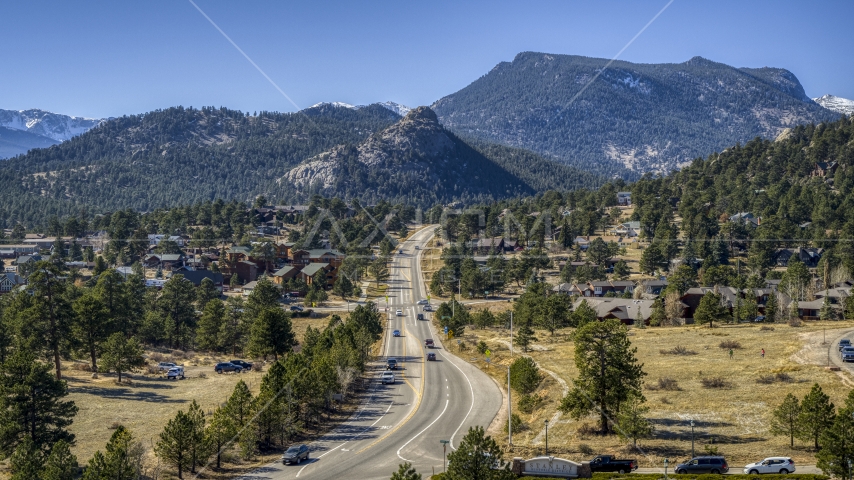 Cars on a road through the mountain town of Estes Park, Colorado Aerial Stock Photo DXP001_000218 | Axiom Images