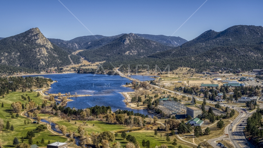 Lake Estes and mountains seen from the golf course in Estes Park, Colorado Aerial Stock Photo DXP001_000219 | Axiom Images