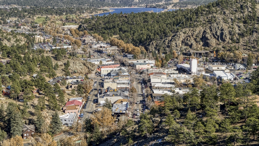 Shops on a road through Estes Park, Colorado Aerial Stock Photo DXP001_000221 | Axiom Images