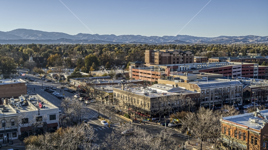 Shops and office buildings beside a quiet street in Fort Collins, Colorado Aerial Stock Photo DXP001_000240 | Axiom Images