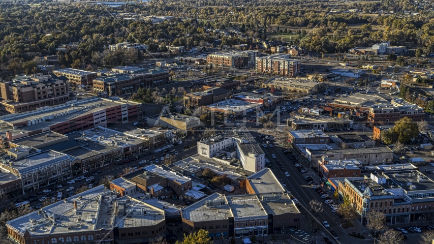 Small shops lining a busy road in Fort Collins, Colorado Aerial Stock Photo DXP001_000249 | Axiom Images