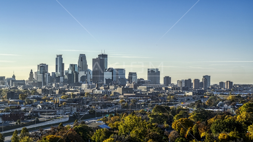 A view of the city skyline's skyscrapers at sunrise in Downtown Minneapolis, Minnesota Aerial Stock Photo DXP001_000276 | Axiom Images