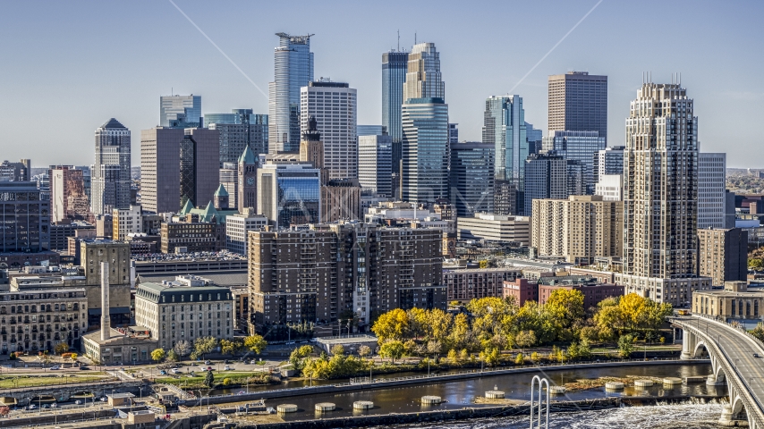 The city's skyline across the Mississippi River, Downtown Minneapolis, Minnesota Aerial Stock Photo DXP001_000299 | Axiom Images