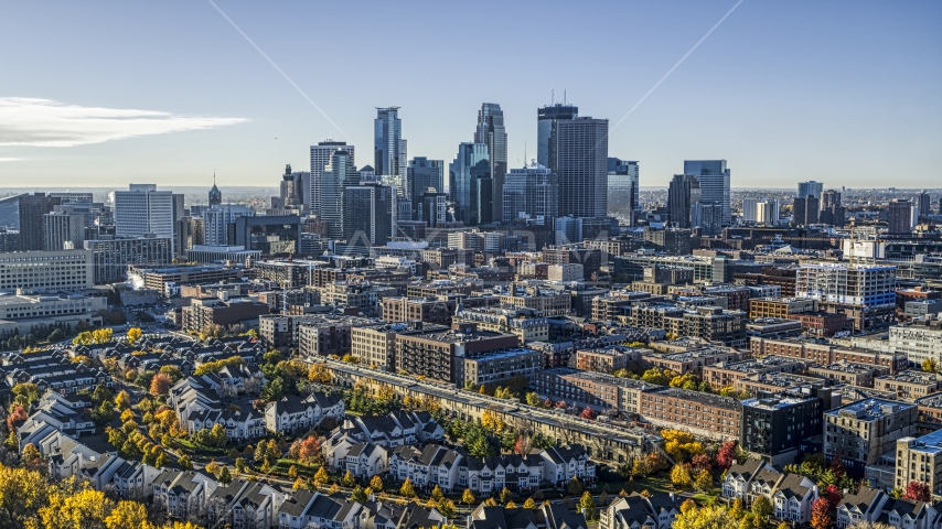 The city's skyline in the distance, seen from a residential neighborhood, Downtown Minneapolis, Minnesota Aerial Stock Photo DXP001_000365 | Axiom Images