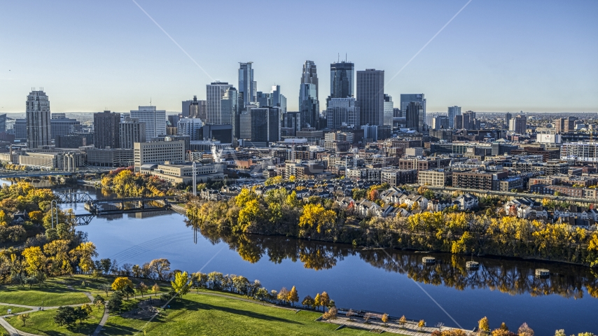 The city's skyline in the distance, seen from the Mississippi River, Downtown Minneapolis, Minnesota Aerial Stock Photo DXP001_000367 | Axiom Images