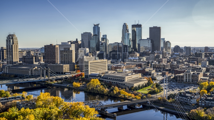 The towering skyline and bridges spanning the river, Downtown Minneapolis, Minnesota Aerial Stock Photo DXP001_000409 | Axiom Images