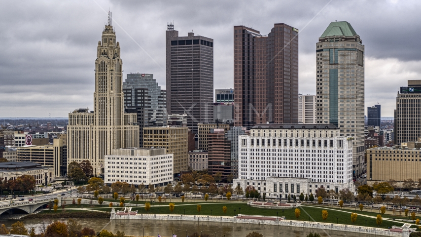 A view across the Scioto River at the skyscrapers of the city's skyline, Downtown Columbus, Ohio Aerial Stock Photo DXP001_000490 | Axiom Images