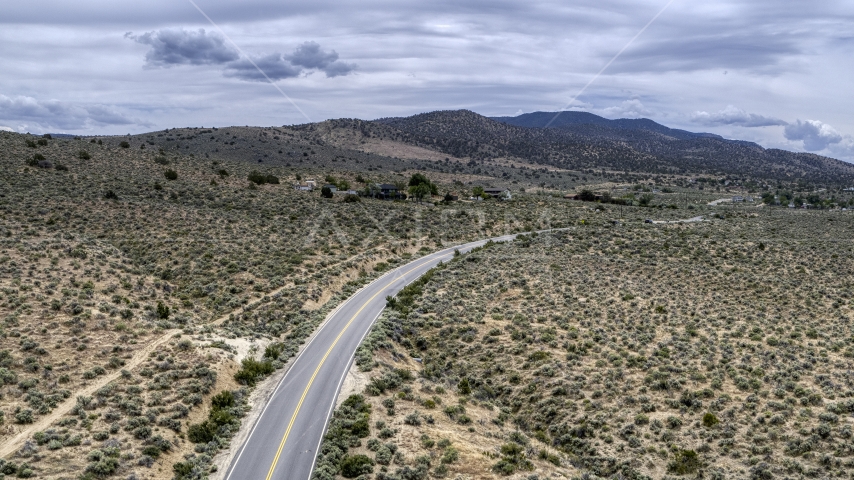 A desert road in Carson City, Nevada Aerial Stock Photo DXP001_007_0004 | Axiom Images