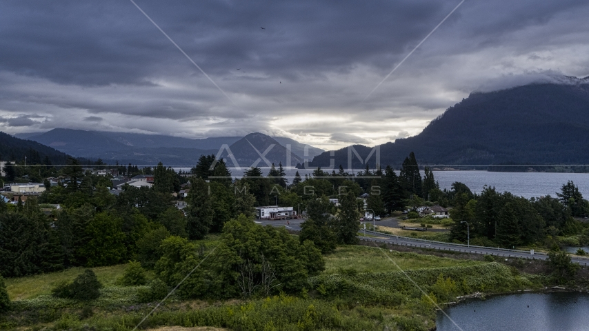 A view of the Columbia River and cloud-shrouded mountains at sunrise, Stevenson, Washington Aerial Stock Photo DXP001_008_0002 | Axiom Images