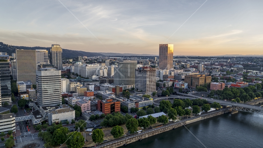 Office buildings and skyscrapers seen from the Willamette River, Downtown Portland, Oregon Aerial Stock Photo DXP001_010_0006 | Axiom Images