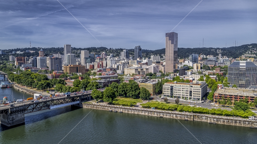 City buildings across the Willamette River in Downtown Portland, Oregon Aerial Stock Photo DXP001_012_0004 | Axiom Images