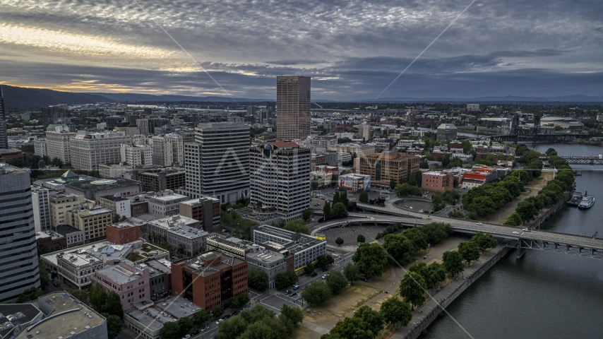 Skyscraper and office buildings by the Willamette River in Downtown Portland, Oregon Aerial Stock Photo DXP001_014_0005 | Axiom Images