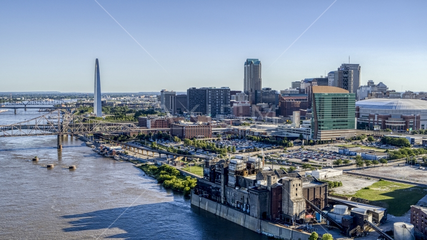 View of the Arch and downtown buildings from the river, Downtown St. Louis, Missouri Aerial Stock Photo DXP001_026_0003 | Axiom Images