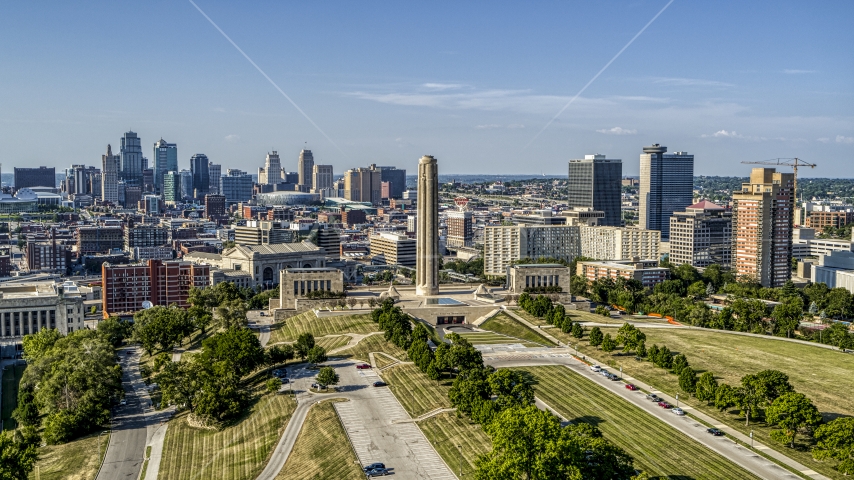 A view of the city's downtown skyline, the WWI memorial, and office buildings in Kansas City, Missouri Aerial Stock Photo DXP001_044_0013 | Axiom Images