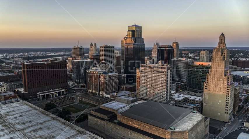 Tall downtown skyscrapers at sunset in Downtown Kansas City, Missouri Aerial Stock Photo DXP001_051_0010 | Axiom Images