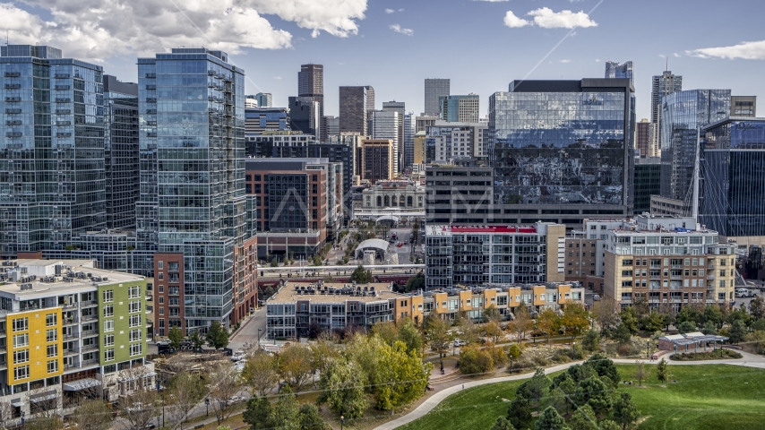 Downtown office buildings with skyscrapers in the background in Downtown Denver, Colorado Aerial Stock Photo DXP001_055_0005 | Axiom Images