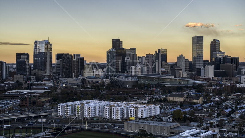 Skyscrapers in the city's skyline at sunset, Downtown Denver, Colorado Aerial Stock Photo DXP001_056_0007 | Axiom Images