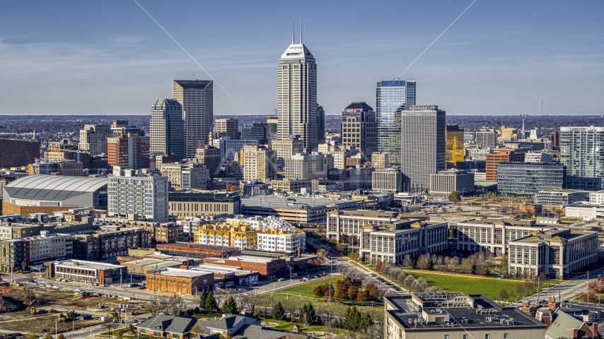 The towering skyscrapers in the city's skyline in Downtown Indianapolis, Indiana Aerial Stock Photo DXP001_090_0008 | Axiom Images