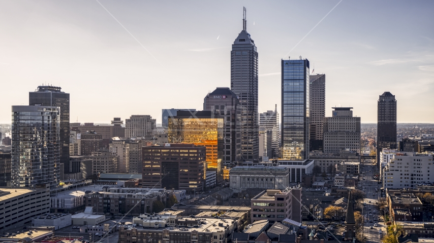 A view of towering skyscrapers in the city's skyline in Downtown Indianapolis, Indiana Aerial Stock Photo DXP001_090_0012 | Axiom Images