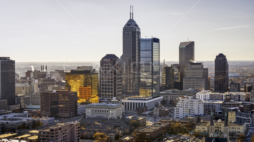 A group of giant skyscrapers in the city's skyline in Downtown Indianapolis, Indiana Aerial Stock Photo DXP001_090_0014 | Axiom Images