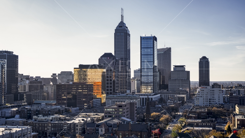 Giant skyscrapers and city buildings in the city's skyline in Downtown Indianapolis, Indiana Aerial Stock Photo DXP001_090_0016 | Axiom Images