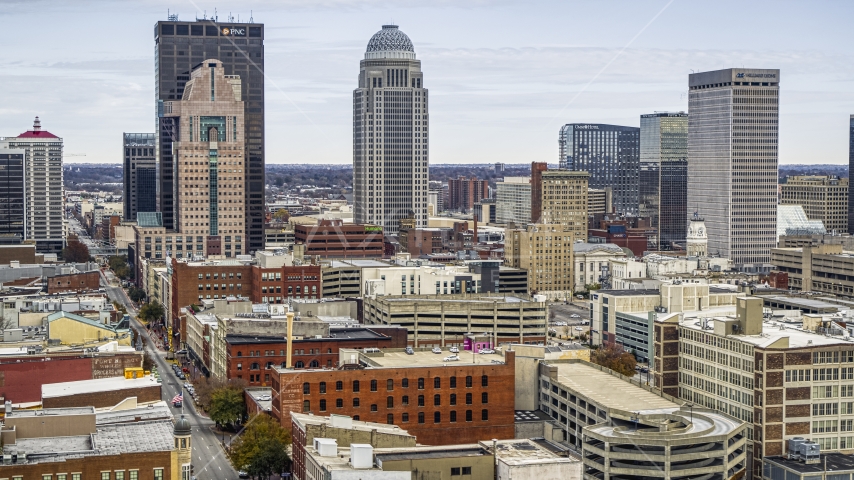 The city skyline from brick city buildings in Downtown Louisville, Kentucky Aerial Stock Photo DXP001_095_0002 | Axiom Images