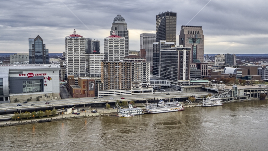 Hotel and skyline seen from the river in Downtown Louisville, Kentucky Aerial Stock Photo DXP001_095_0010 | Axiom Images