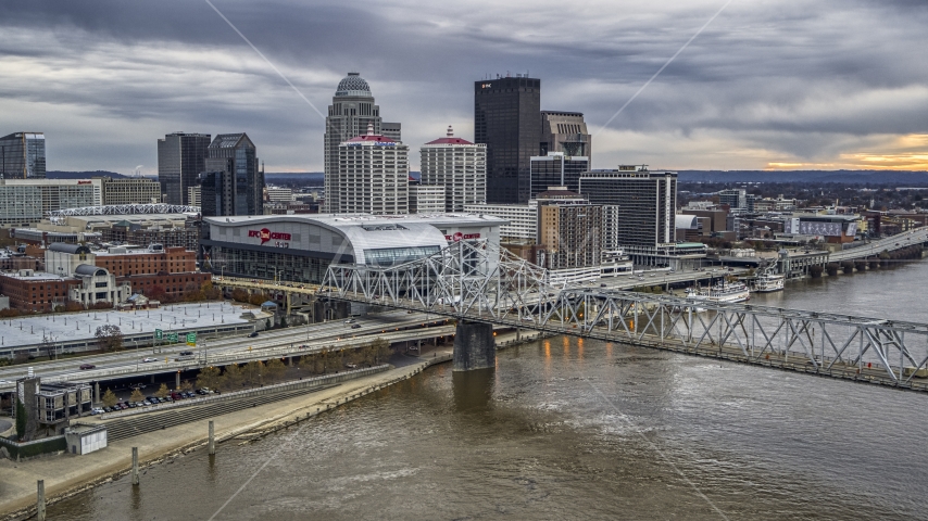 The skyline at twilight, seen from Ohio River, Downtown Louisville, Kentucky Aerial Stock Photo DXP001_096_0001 | Axiom Images