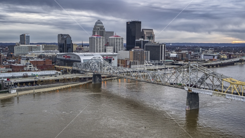 The city's skyline at twilight, seen from Ohio River, Downtown Louisville, Kentucky Aerial Stock Photo DXP001_096_0002 | Axiom Images