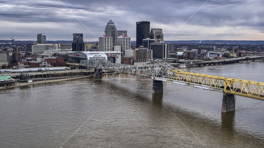 The skyline lit up at twilight and the Ohio River, Downtown Louisville, Kentucky Aerial Stock Photo DXP001_096_0003 | Axiom Images