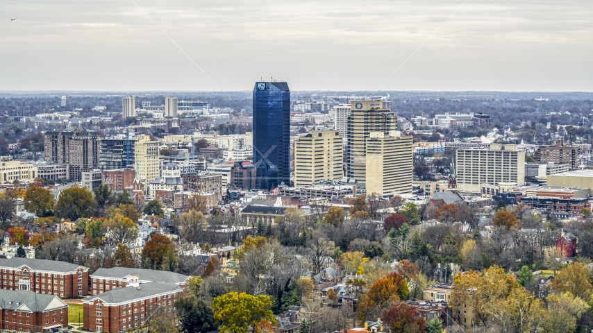 A view of the city's skyline, seen from tree-lined neighborhoods, Downtown Lexington, Kentucky Aerial Stock Photo DXP001_099_0003 | Axiom Images