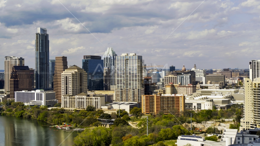 A view of giant city skyscrapers and high-rises in Downtown Austin, Texas Aerial Stock Photo DXP002_103_0004 | Axiom Images